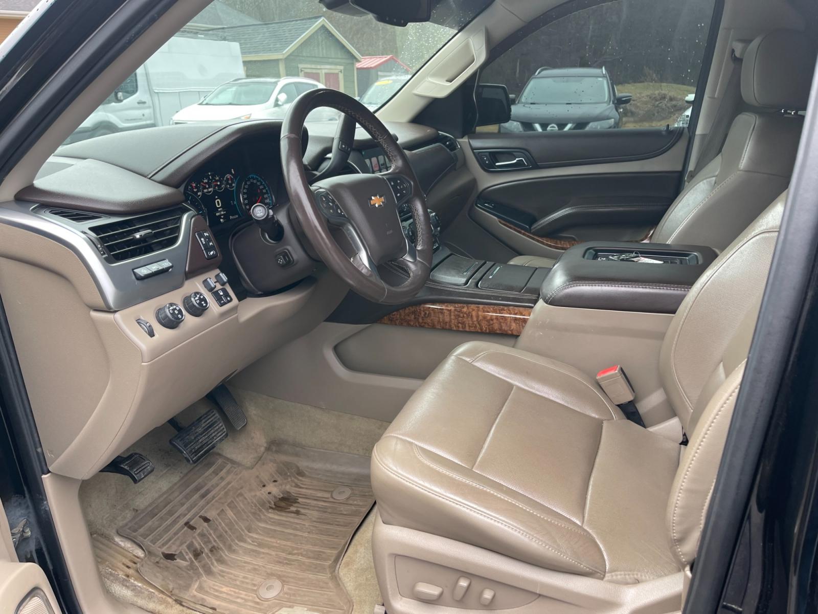 2016 Black /Brown Chevrolet Suburban LTZ 4WD (1GNSKJKC3GR) with an 5.3L V8 OHV 16V engine, 6A transmission, located at 11115 Chardon Rd. , Chardon, OH, 44024, (440) 214-9705, 41.580246, -81.241943 - This 2016 Chevrolet Suburban LTZ 4WD comes equipped with a 5.3 Vortec V8 engine and a 6-speed automatic transmission, offering a robust 8,000-pound towing capacity. It's designed with luxury and convenience in mind, featuring heated and cooled front seats, heated second-row seats, and a range of saf - Photo #18